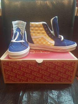 Blue and yellow suede checkered vans
