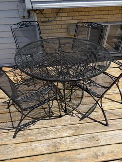Cast iron table and chairs