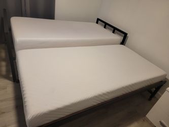Twin bed with memory foam included      (like new)