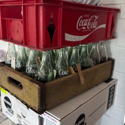 Lot of Coca Cola Bottles and Coca Cola carrier & Wooden