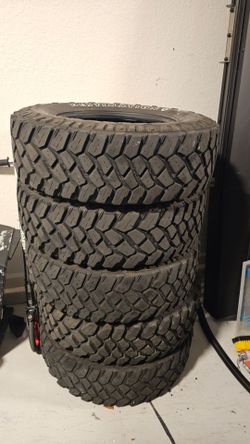 Firestone Destination Mud Terrain tires, 255/75 R17 (32 inches).