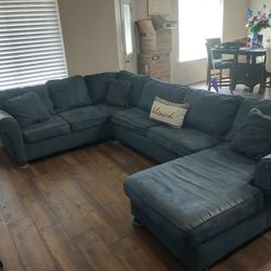 Large Blue Secional With Pull Out Bed
