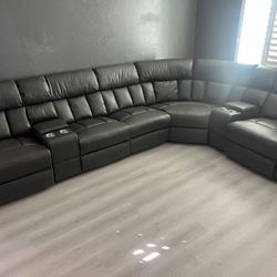 New Reclining Sectional.  Grey Or Ink Blue Gel Leatherette.  123” X 123”.  Free Delivery!