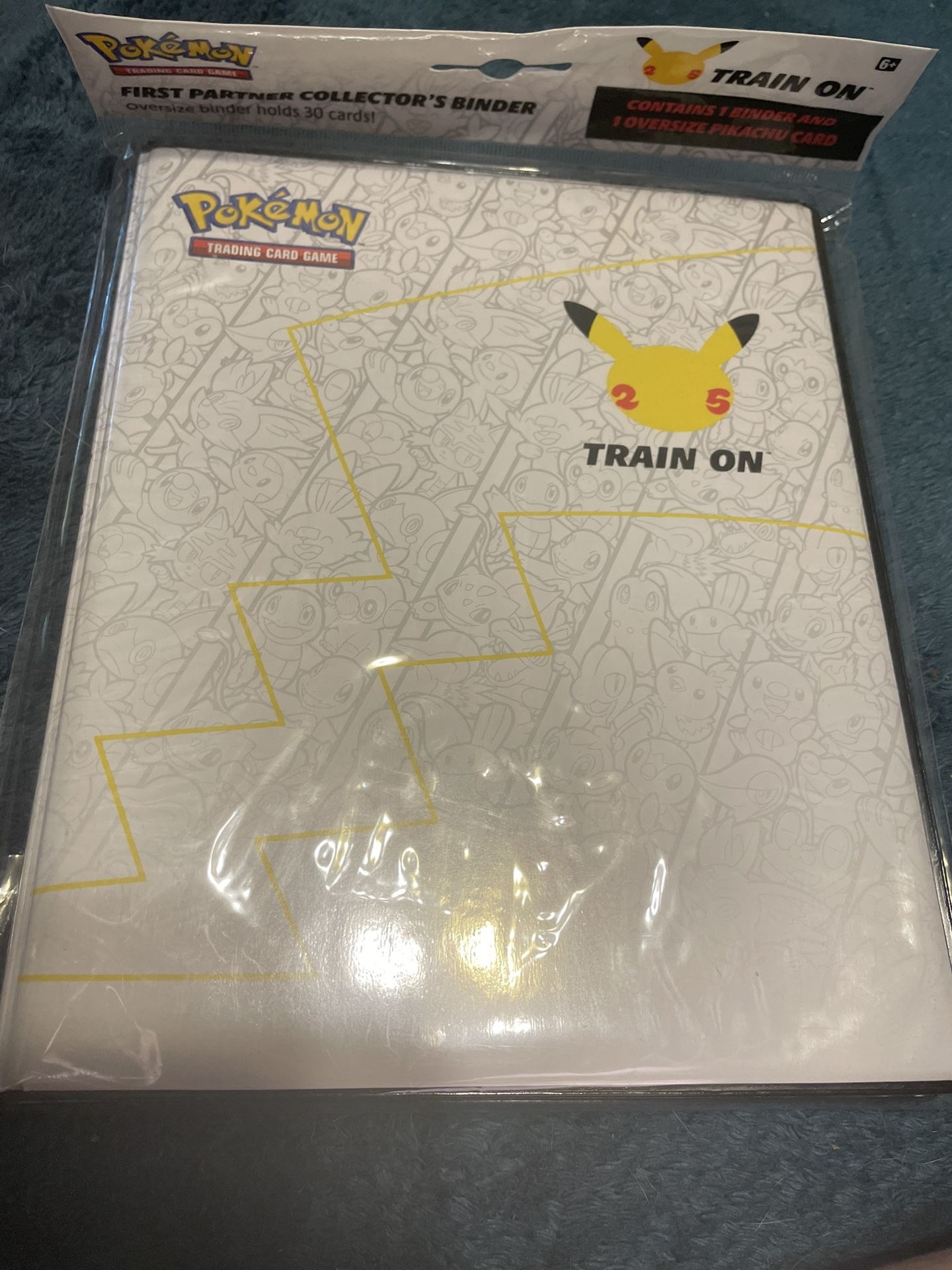 Pokémon 25th Anniversary Oversized Binder. With A Pikachu Promo Card Sealed. Factory Sealed. The First Partner Pack Is Opened All 3 Oversized Inside