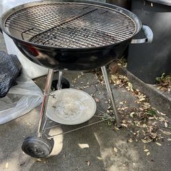 Weber charcoal grill with 18 pounds charcoal