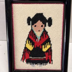 Vintage needle point of Navajo girl