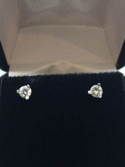 14 K W diamond studs 0.21 CT’s