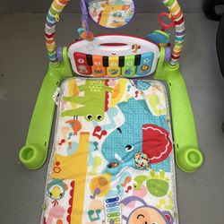Fisher-Price Baby Playmat Deluxe Kick & Play Piano Gym, Green Musical, Learning with Developmental Activities for Newborns 0+ Months