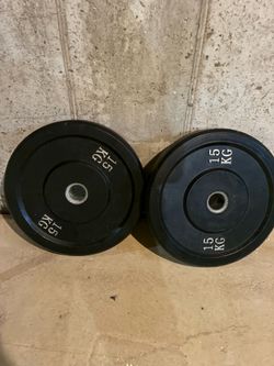 2 rubber 15 kg (33lbs) plates