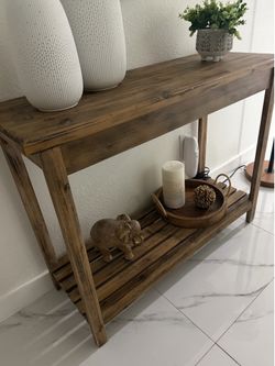 Wood console table, mirror and decorative ladder