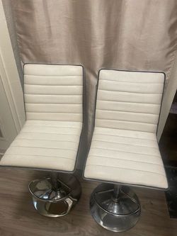 Two white barstools