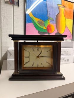 VINTAGE TURNING CLOCK