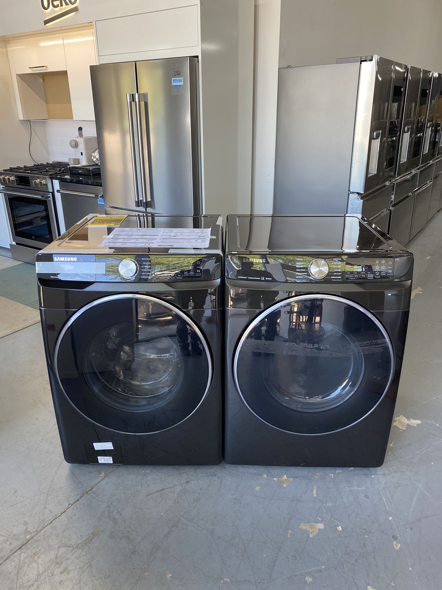 NEW Samsung front loading washer and electric dryer set!