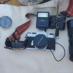 35 MM Camera With Lenses And Flash