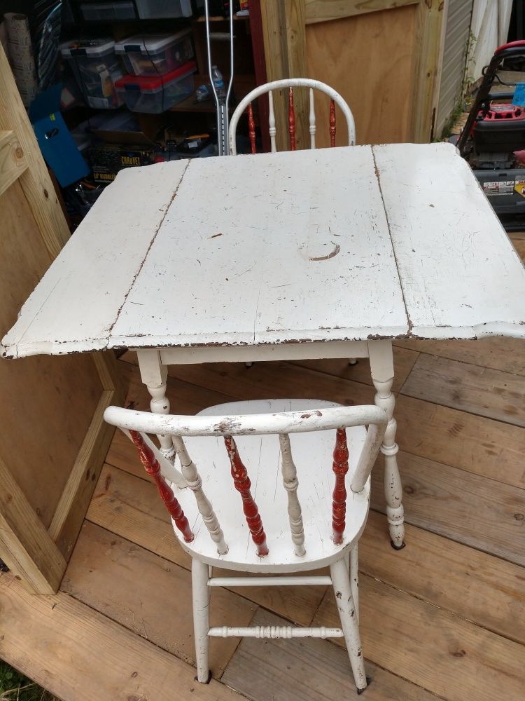 Small kitchen table with two chairs