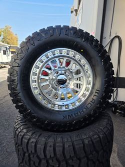 17" KMC w/ 33" RT tires. $1900