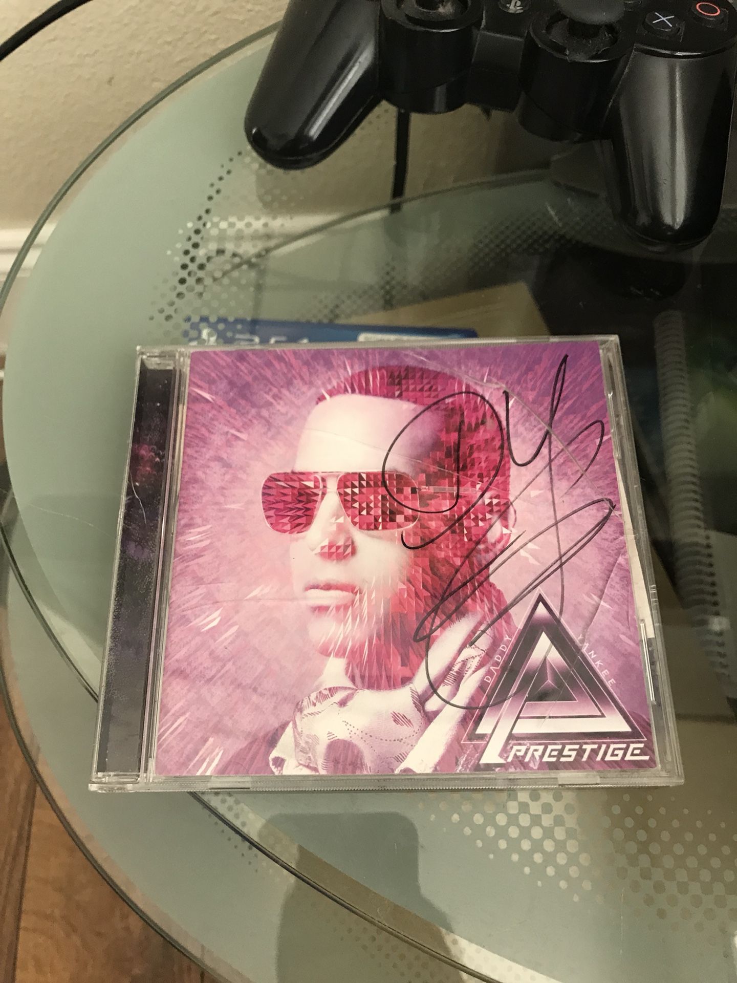 PRESTIGE ALBUM SIGNED BY DADDY YANKEE