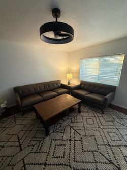 Living Spaces Leather Couch & Loveseat