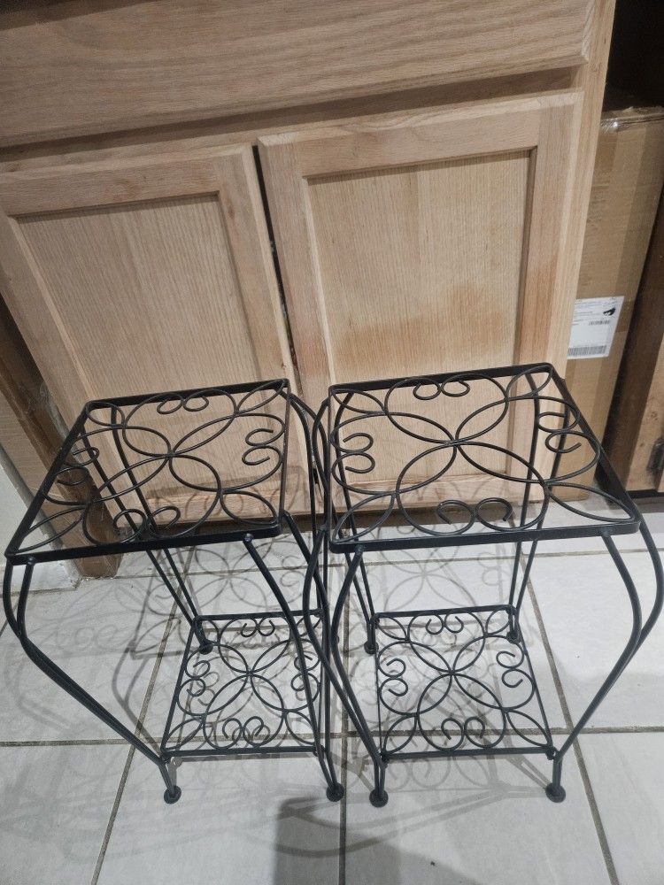 Two decorative iron tables