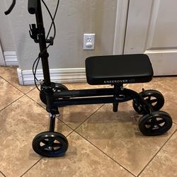 KneeRover Steerable knee Scooter, Black. For users between 4’9” and 6’4”. Locking Hand Brake.