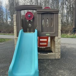 Kids play set with climber walls and slide