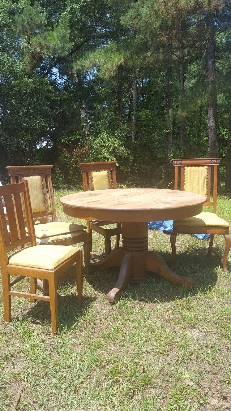 Antique table and chairs. Needs refinishing and repair