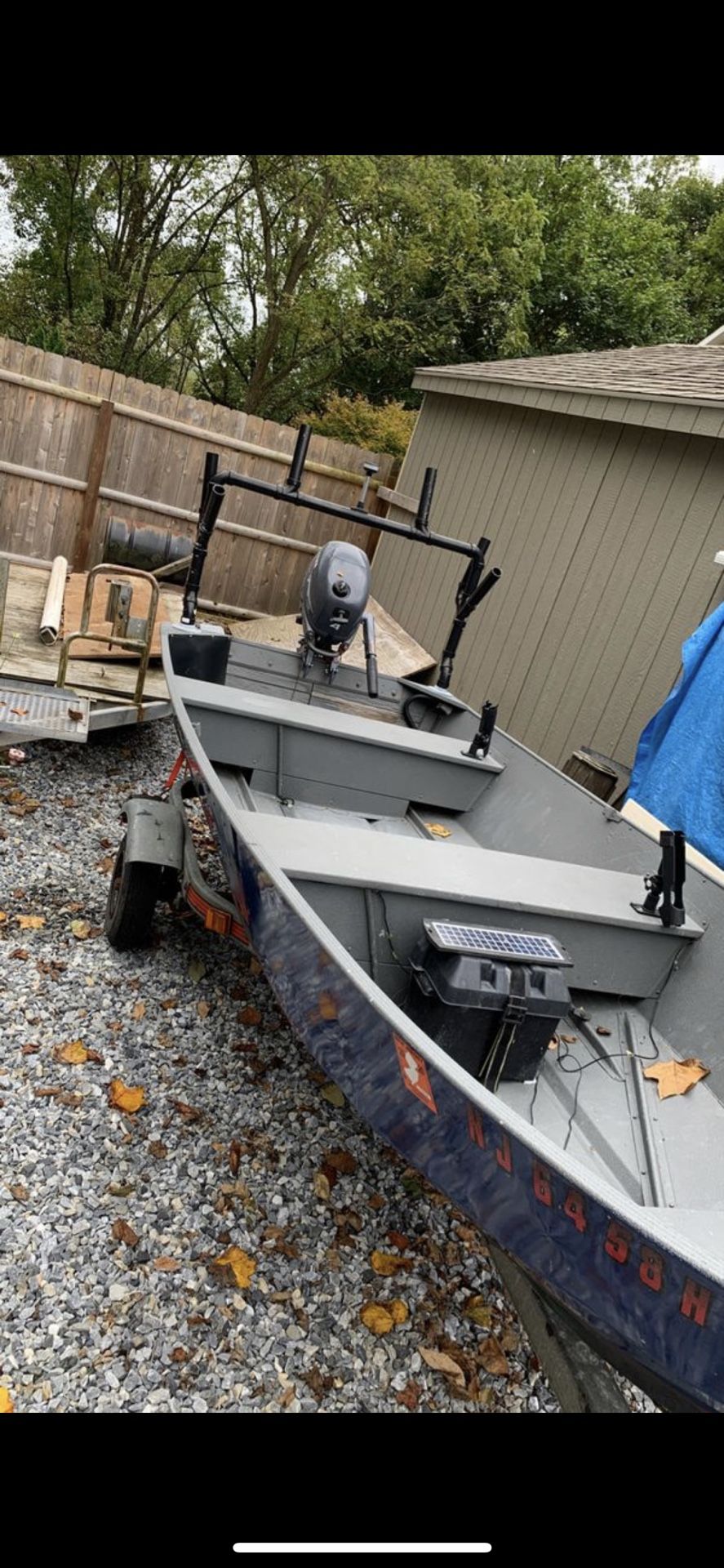 Monarch open aluminum boat with Motor and trailer