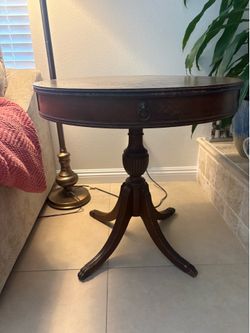 Antique leather inlay drum table