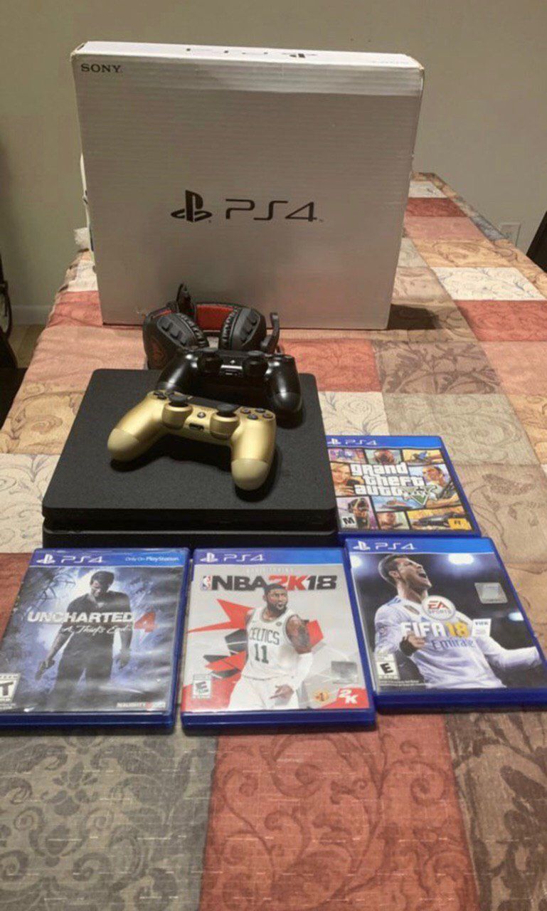PS4, 2 controllers, headphones and games