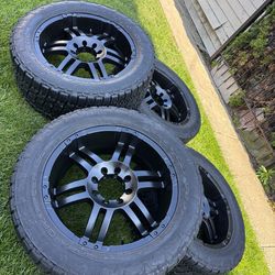 Wheels  22x10  8x165.1  8x6.5 good  tires  325 50 22