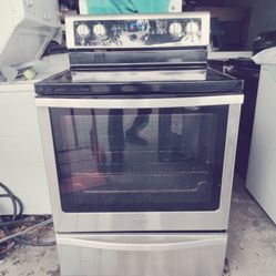 brand new and like new complete matching Whirlpool stove low profile microwave combination original warranties