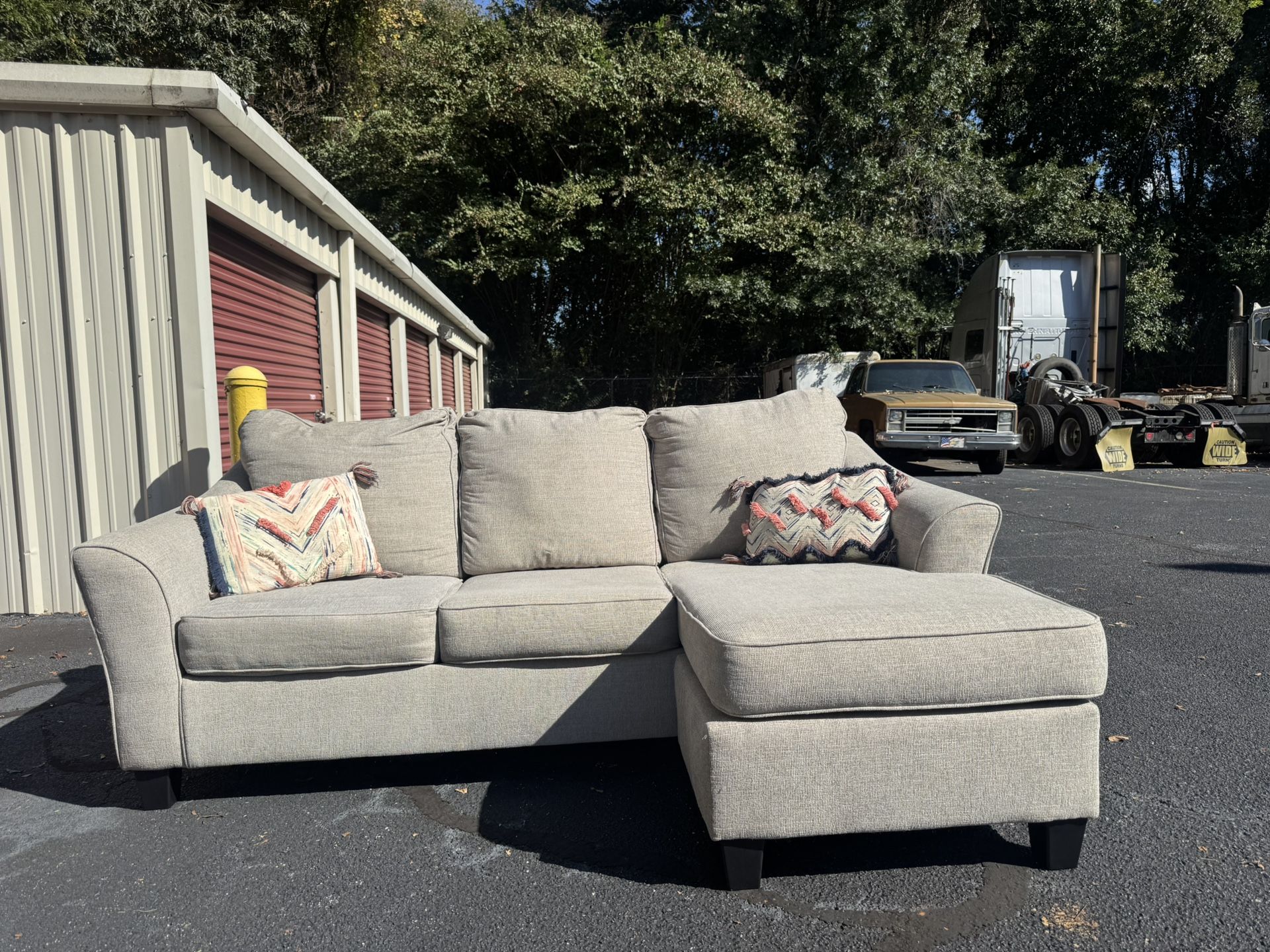 Beautiful Grey Sectional W/Reversible Chaise ( Delivery Available )