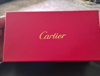Brand new Cartier green and gold glasses