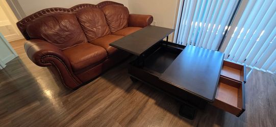 Leather Couch and wooden Coffee table