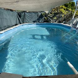 Above ground pool 18  Long x 8 Wide By 4 Feet Deep 