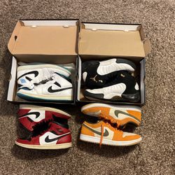 Four Nike Jordans Shoes