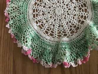 2 vintage hand crocheted round doilies with ruffled green pink edge 8”