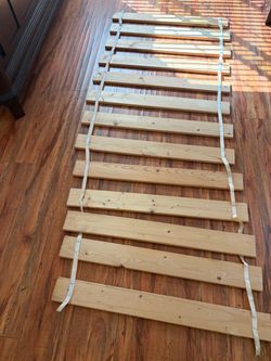 Two queen size wooden bed slats