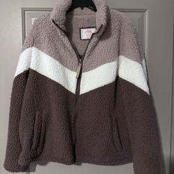 Mauve color block. Dusty rose, creamy white, dark raspberry. Zippered front. Nice color. Teddy style. Fleece lined. 100% polyester. Machine wash cold&