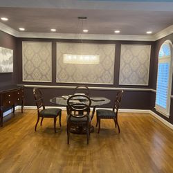 Dining Room Table With four Chairs. Buffet with Granite top. Over Size Mirror. Great Condition. Solid Cherry Wood.