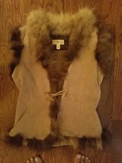 Genuine suede and raccoon fur vest