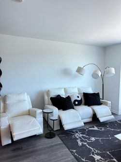 White leather reclining sofa with reclining chair