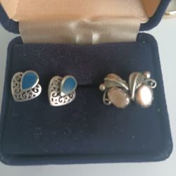 2 Pair Of Earrings.