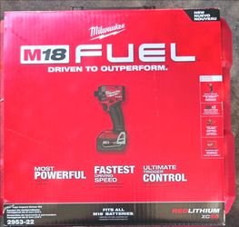 Milwaukee fuel impact with 2 batteries xc5ah & charger.