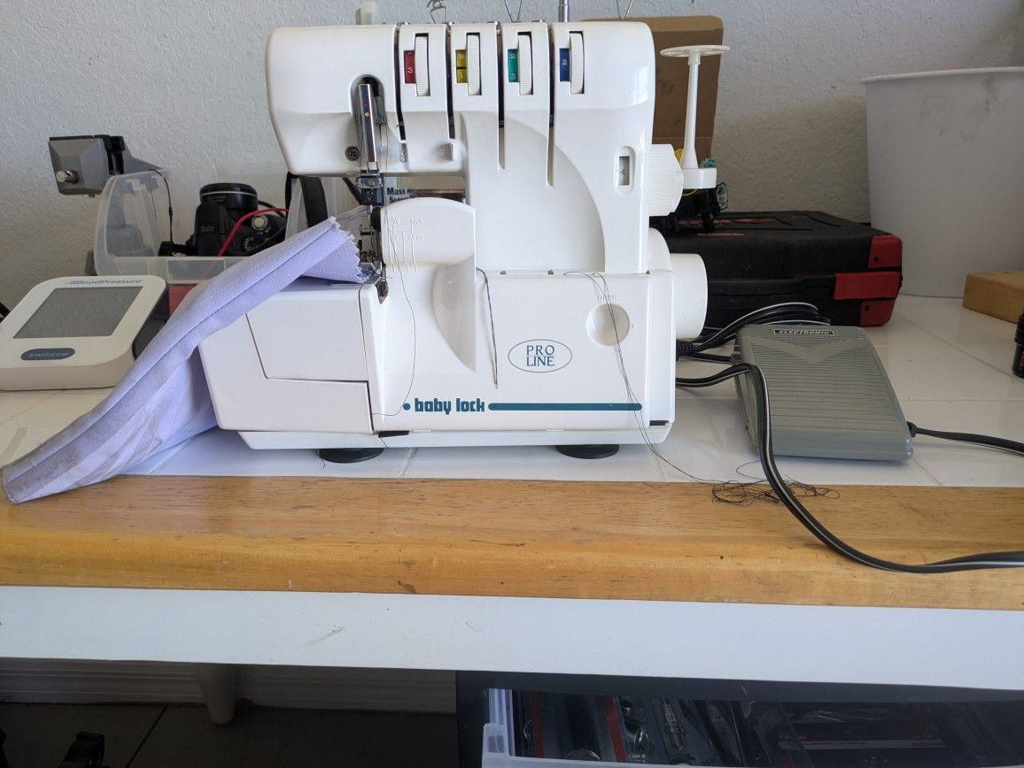 Machine , Mero , The picture shows a Baby Lock Pro Line sewing machine.