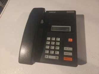 black Nortel Norstar M7100 digital display telephone