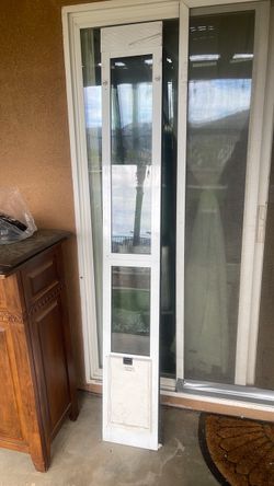 Regular size doggy door for sliding door good condition $40 obo