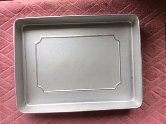 Wilton Pan 11” x 15” x 2” high $10.00 and (12” x 18” x 2” $12.00)