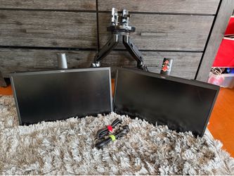 Dual Lot 2 Dell Monitors with adjustable arm stand.