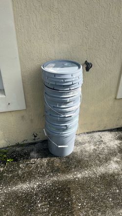 Empty buckets with lids
